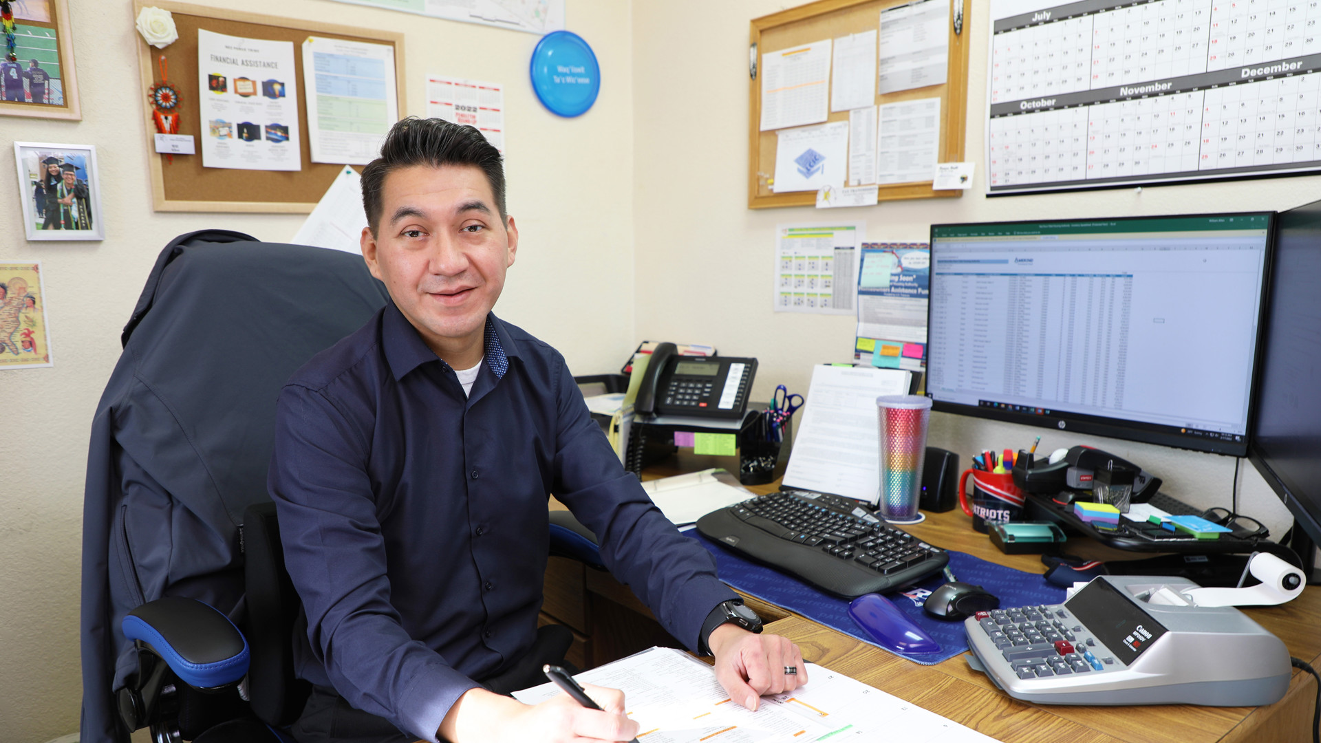 Applied Accounting graduate at work